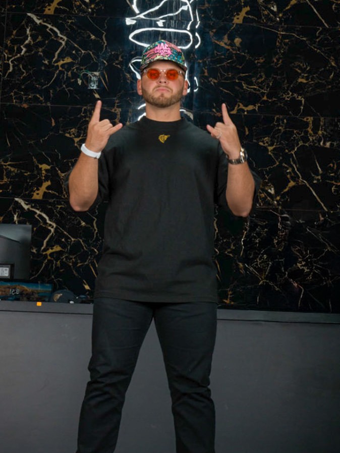 Portrait of Layne, co-founder of RüS